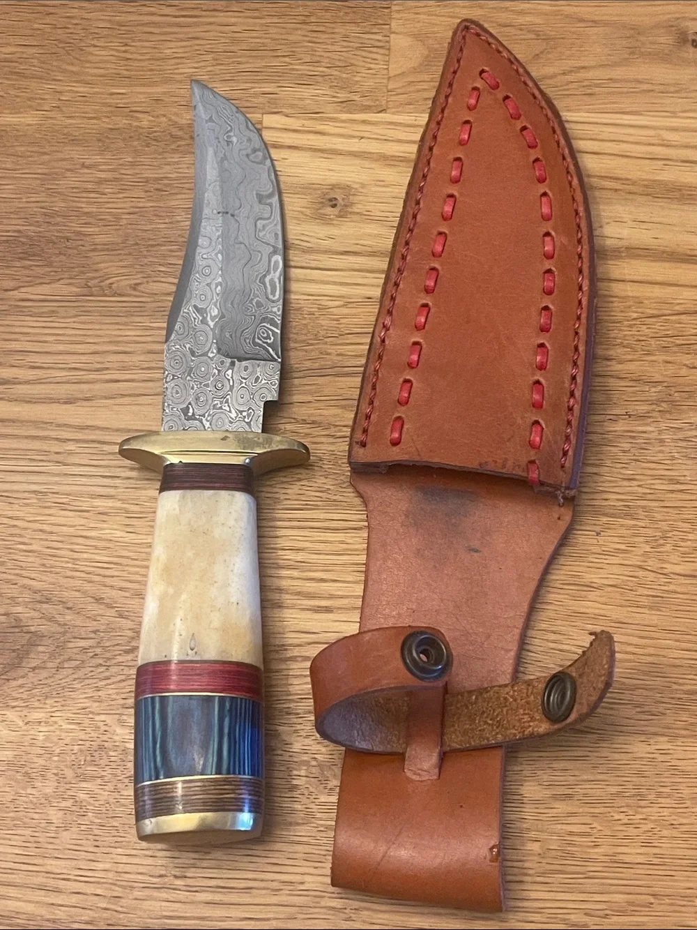 Damascus Blade Fixed Knife with Ivory-Tone and Blue Handle Accents